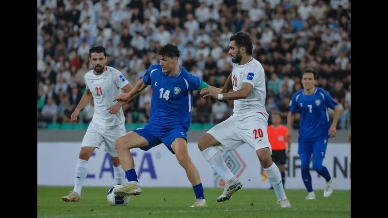 Cầu thủ Iran dẫn bóng tinh tế qua hàng phòng ngự Tanzania Cầu thủ Iran dẫn bóng tinh tế qua hàng phòng ngự Tanzania